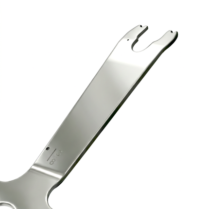 Beveled wedge edge on the Motorola 6685666D01 tool designed to separate radio chassis from front cover.