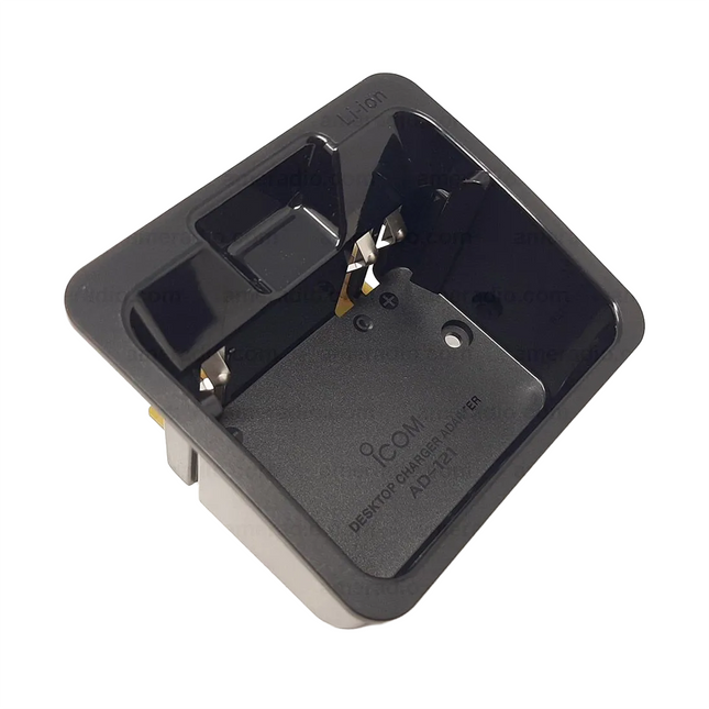 Close-up detail of the electrical terminal contacts inside the Icom AD121 adapter cup.