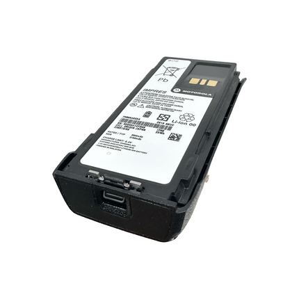 Motorola PMNN4603A IMPRES Li-Ion Battery for MOTOTRBO R7 shown securely attached to the back chassis of a handheld radio handset.