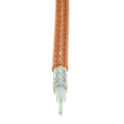Close-up of the stranded silver-plated copper conductor and PTFE dielectric on RG400 cable.